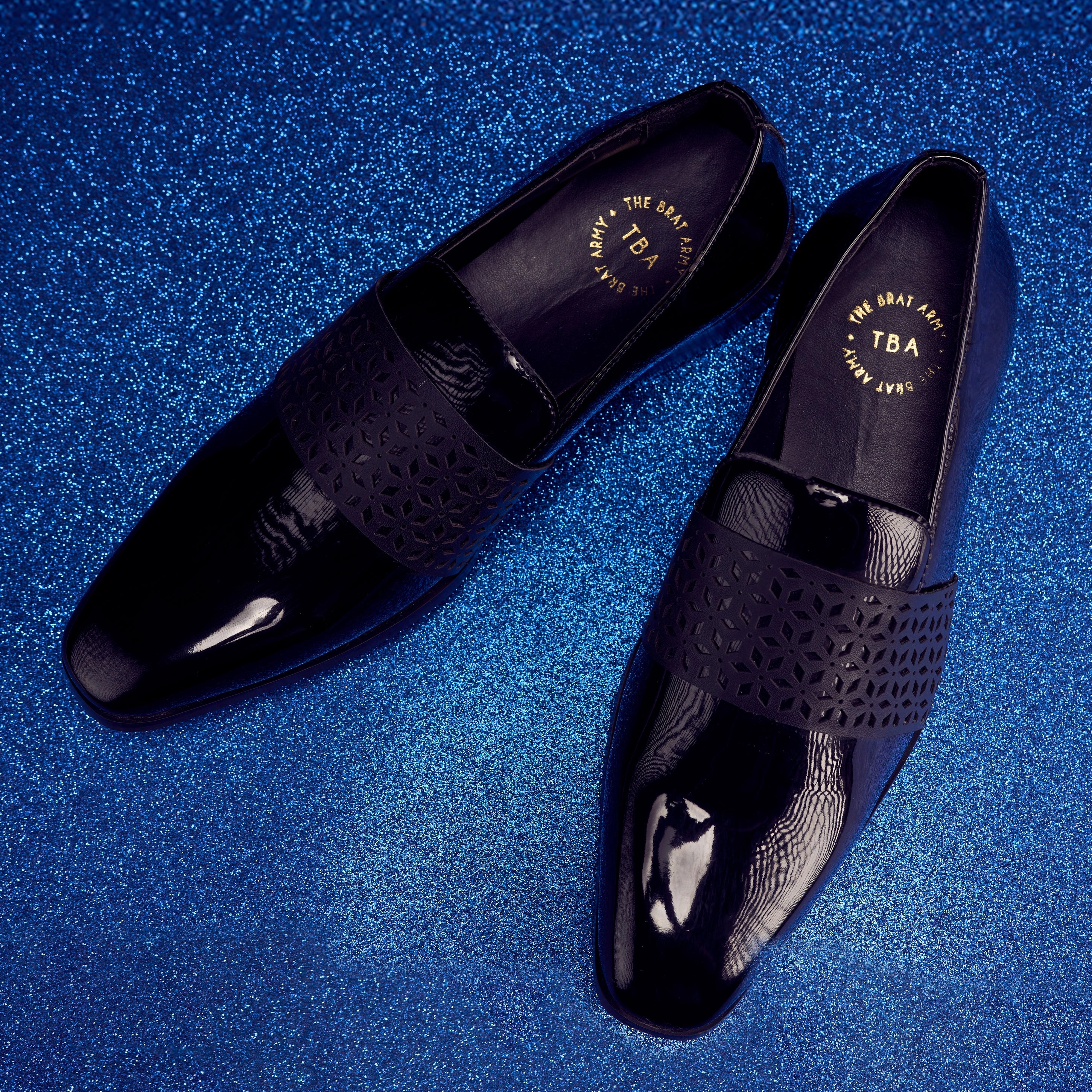 No Sock Slip On Shoes The Brat Army Montreux Patent Black Carved Strap Loafers.